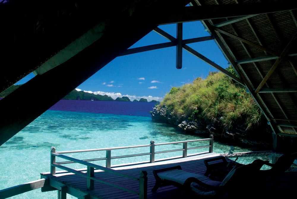 The glorious view from Villa No. 5, where blacktip sharks patrol the reef